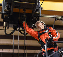 Konecranes technician inspecting hoist