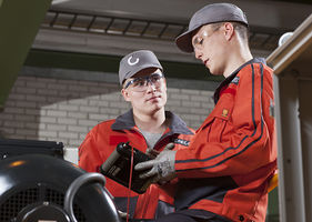 Konecranes technicians assess crane
