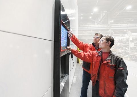 Automated warehouse Agilon and 2 users in front of the SSAB Raahe Agilon user access point
