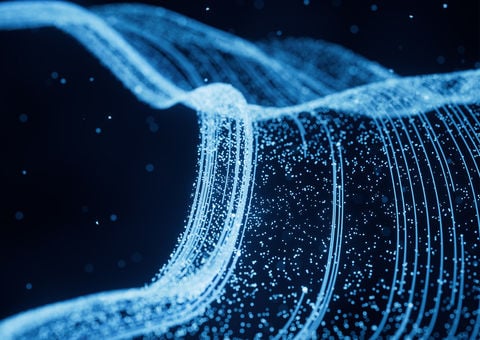 Abstract blue curved lines on black background.