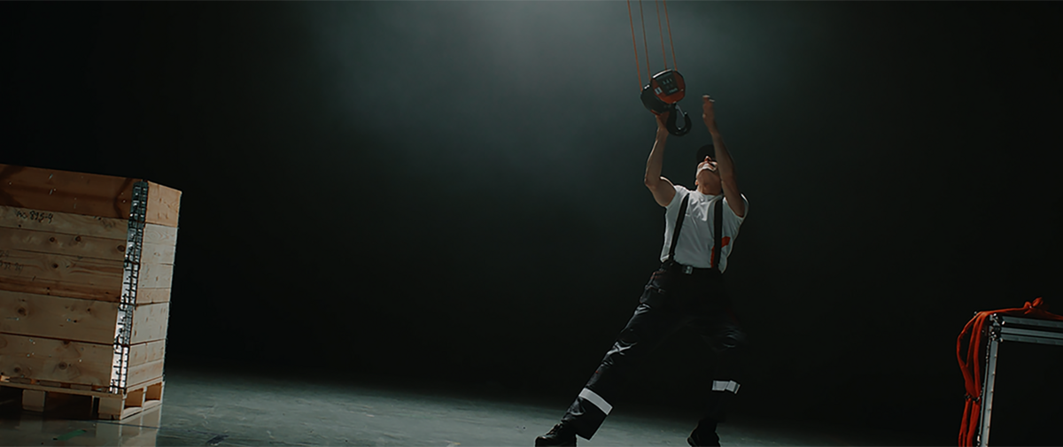 Konecranes employee dancing with crane